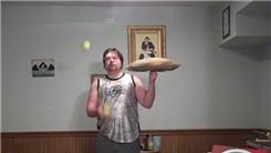 Longest Time To Spin A Pillow On One Finger While Juggling Two Tennis Balls