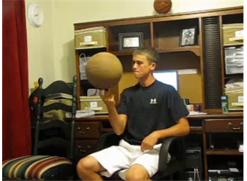 Longest Time Spinning Basketball On Finger In An Office