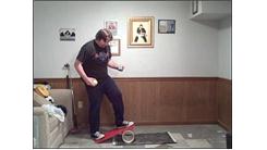 Most Consecutive Table Tennis Ball Bounces On A Rubik's Cube While Juggling Two Tennis Balls On A Rola Bola