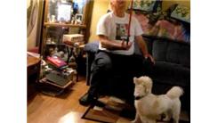 Longest Time To Balance Broom On Hand While Sitting On Couch