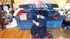 Longest Time To Balance 24 Hockey Pucks and Two Hockey Sticks On Chin