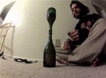 Fastest Time To Remove A 10-Dollar Bill From Between Two Wine Bottles