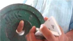 Most Saber's Revolution 2 And Chen Ka Card Cut Combinations In 30 Seconds While Holding A 15-Pound Exercise Plate With Index Finger