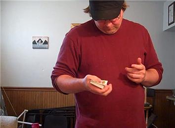 Most Consecutive One-Handed Full Flips Of The Top Card On A Deck Of Playing Cards In One Minute