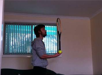 Longest Time To Balance A Tennis Racket On A Tennis Ball