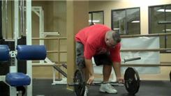 Most Consecutive Arm Curls Using A 107-Pound EZ Curl Barbell