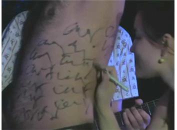 Most Autographs Signed On A Stranger\'s Torso In One Minute