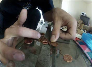 Most Pennies Balanced Vertically On A Penny