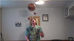 Most Consecutive Catches With Five Balls While Spinning A Basketball On A Mouthstick Held In Mouth
