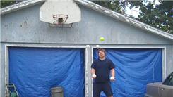 Most Consecutive Catches Juggling Five Softballs While Balancing On A Rola Bola