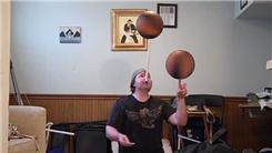 Most Playing Cards Dealt Individually With One Hand While Spinning A Basketball On One Finger And Spinning A Basketball On Mouthstick Held In Mouth