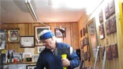 Longest Time Balancing Two Golf Balls On Top Of An Axe And An Egg On Top Of A Golf Club On Chin