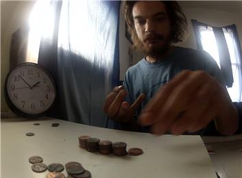 Tallest Penny Tower Stacked On Right Ring Finger