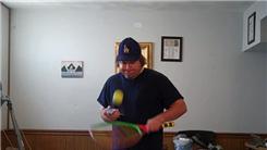 Most Cap'n Crunch Card Cuts Performed In One Minute While Bouncing A Tennis Ball On Alternating Sides Of A Tennis Racket