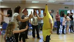 Most High Fives In One Minute While Wearing A Banana Costume