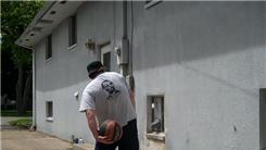 Most Behind-The-Back Bounces Of A Basketball Off The Side Of A Building In One Minute