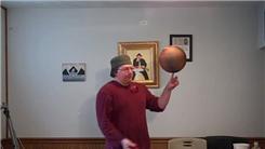 Most Catches Juggling Two Balls In One Hand While Spinning A Basketball