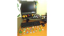 Most Kinder Egg Toys Displayed On An Office Desk In The USA