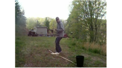 Most Tosses Of A Golf Ball Behind The Back Into A Trash Can In One Minute