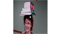 Most Cancer-Related Books Balanced On Head