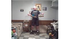 Longest Time To Balance A Glass Of Water On A Broom In Each Hand While Standing On A Rola Bola