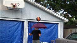 Longest Time To Spin A Basketball On Top Of An Open Umbrella While Holding It In One Hand