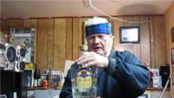 Longest Time Balancing A 1.7-Liter Bottle Of "Crown Royal" On Back Of Hand