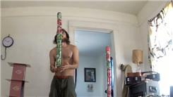 Tallest Soda Can Tower Balanced On Left Ring Finger