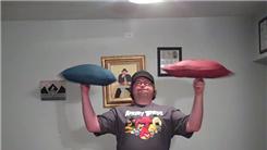 Longest Time Spinning Two Pillows On Fingers