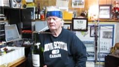 Longest Time To Balance A Bowie Knife On Top Of A Champagne Bottle On Back Of Right Hand