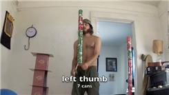 Tallest Soda Can Tower Balanced On Left Thumb