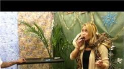 Fastest Time To Eat Five Milky Ways With Four Snakes Wrapped Around Neck