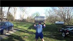 Most Overhead Presses Using A 152-Pound Keg