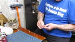 Tallest Penny Tower Stacked On Left Pinky Finger 