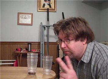 Most Consecutive Times to Blow an 8 Ounce Cup From an 8 Ounce Cup Into Another 8 Ounce Cup Stacking Them With While Blowing on Them
