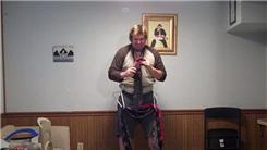 Most Neckties Tied and Worn In One Minute While Balancing On A Rola Bola