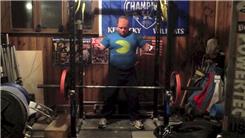 Most Curl-Ups With A 135-Pound Barbell While Standing