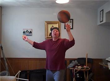 Fastest Time to Do the One Handed Cobra Cut While Spinning a Basketball on Other Finger