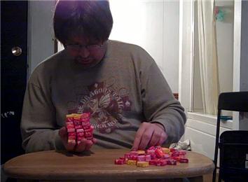 Most Starbursts Held In One Hand