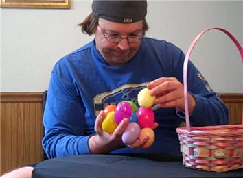 Most Plastic Easter Eggs Held In One Hand