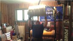 Most Overhead Presses Using A 78-Pound Keg