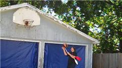 Most Catches Juggling Three Clubs While Spinning A Basketball On A Mouthstick Held In Mouth And Standing On A Rola Bola