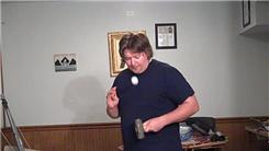 Most Eisenhower Silver Dollar Coin Rolls In One Minute While Bouncing A Golf Ball On A Four-Pound Sledgehammer