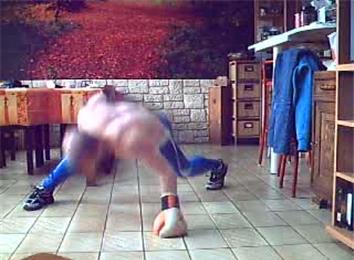 Most Consecutive One-Armed Clapping Push-Ups While Wearing A Boxing Glove