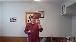 Most One-Handed Thumb Card Cuts While Spinning A Basketball On One Finger