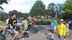 Longest Time To Palm Spin Four Acrylic Balls While Riding A Unicycle