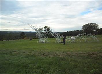 Most Cartwheels In Front Of An Outdoor Sculpture