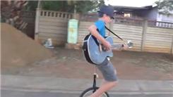 Longest Time Playing Guitar While Riding On A Unicycle
