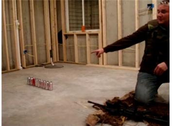 Most Empty Soda Cans Penetrated By A Single Cotton Swab Shot Out Of A 22-Caliber Rifle