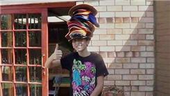 Most Hats Worn While Riding A Unicycle